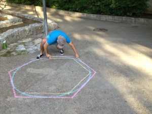 Inscribing a regular hexagon within a circle that itself is inscribed in a larger hexagon.